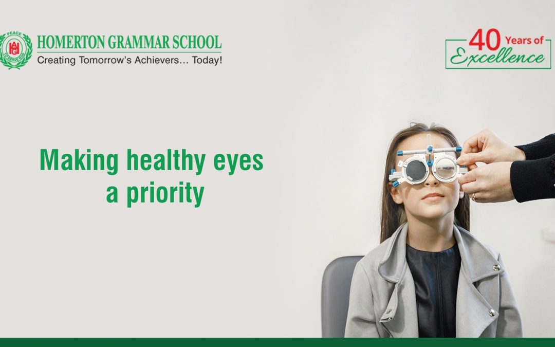 Why is it important to organise regular eye check-ups in schools?